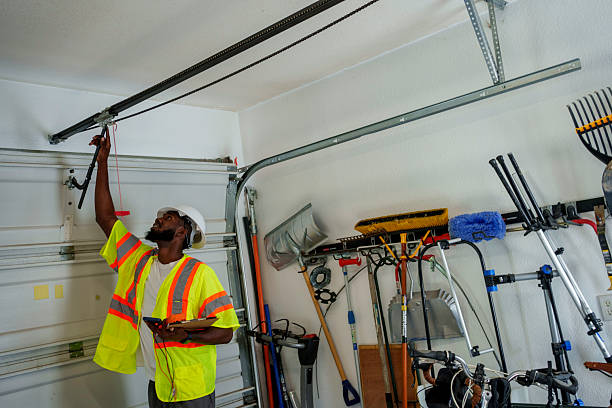 Professional Garage Door Panel Replacement technician working in Roaming Shores, OH